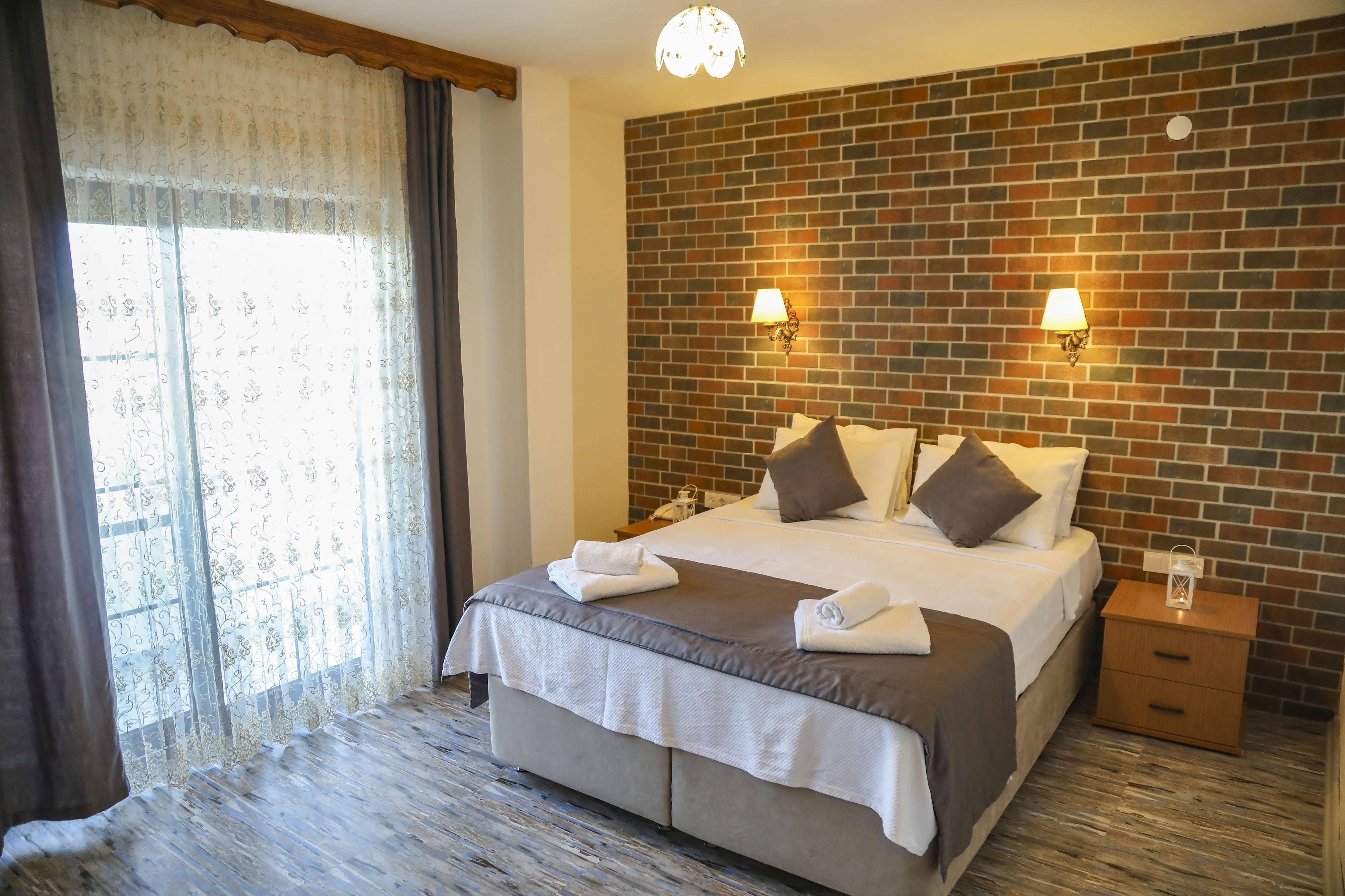 Aksu Hotel Alacatı Bagian luar foto